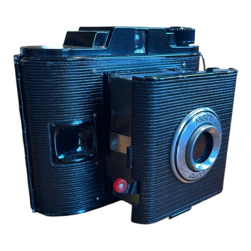 Black Film Photography Camera with Textured Body and Circular Lens UNTESTED